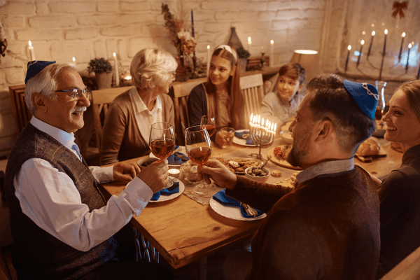 Jewish Family eating dinner together